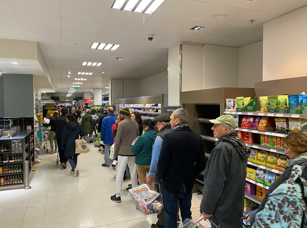 store detective observing customers