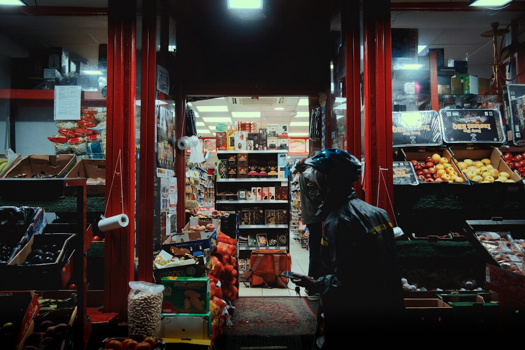 store detective catching thief