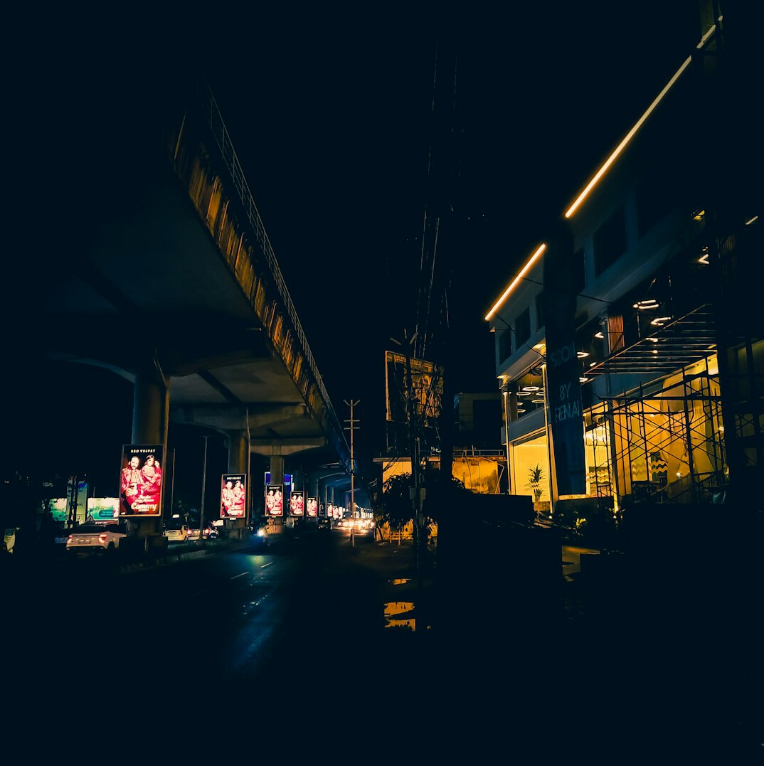 City street at dusk with warm lights