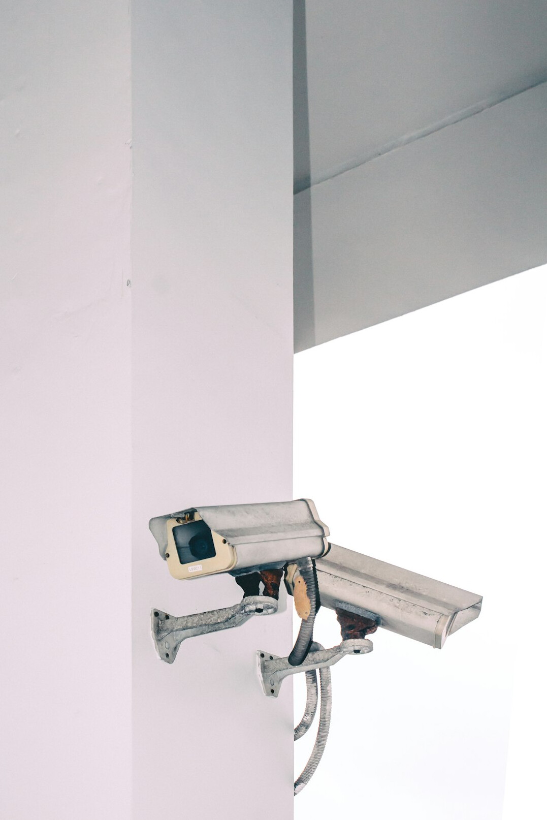 store security guard monitoring cameras