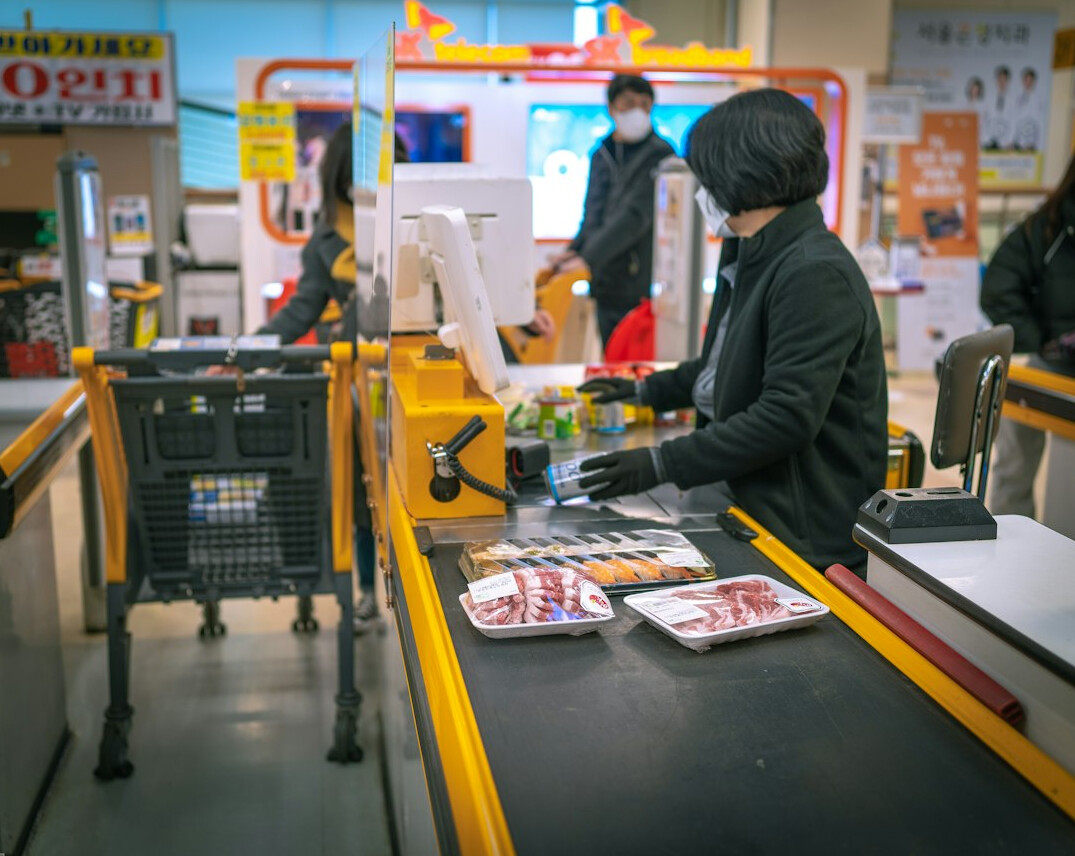 store detective watching customers