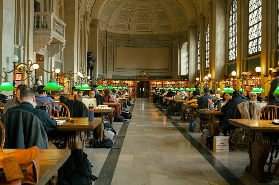 Public library reading hall with long tables